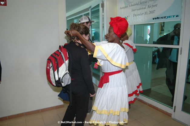 MBJ Airports Limited Welcomes WestJet Airlines - Inaugural Scheduled Service From Toronto Pearsons International Airport - Monday, December 10, 2007 - Sangster International Airport - MBJ Airports Limited, Montego Bay, Jamaica W.I. - Photographs by Net2Market.com - Barry J. Hough Sr, Photographer - Negril Travel Guide, Negril Jamaica WI - http://www.negriltravelguide.com - info@negriltravelguide.com...!