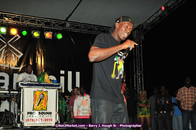 Usain Bolt of Jamaica - The Fastest Man In The World  - Usain Bolt Homecoming Celebrations Concert at the William Knibb High School Play Field, Trelawny - Ice, Ding Dong, Ravers Clavers, D'Angel, Voicemail, RDX and Dancers, Wayne Marshall, Tammi Chynn, Bugle, Nero, Tanya Stephens, Richie Spice, Kip Rich,and Shaggy - Photographs by Net2Market.com - Barry J. Hough Sr. Photojournalist/Photograper - Photographs taken with a Nikon D300 - Negril Travel Guide, Negril Jamaica WI - http://www.negriltravelguide.com - info@negriltravelguide.com...!